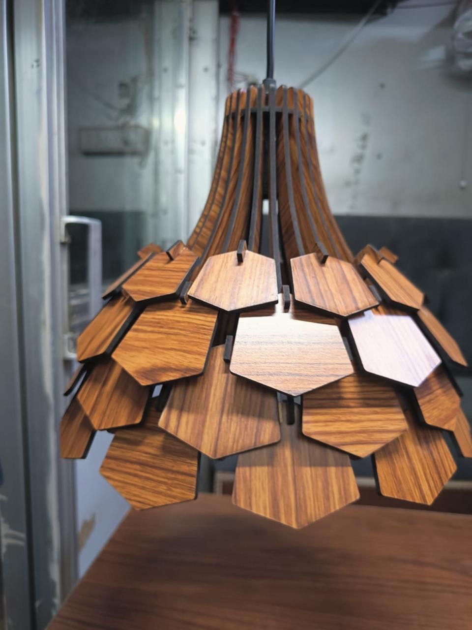 Artistic Wood-Layered Pendant Light